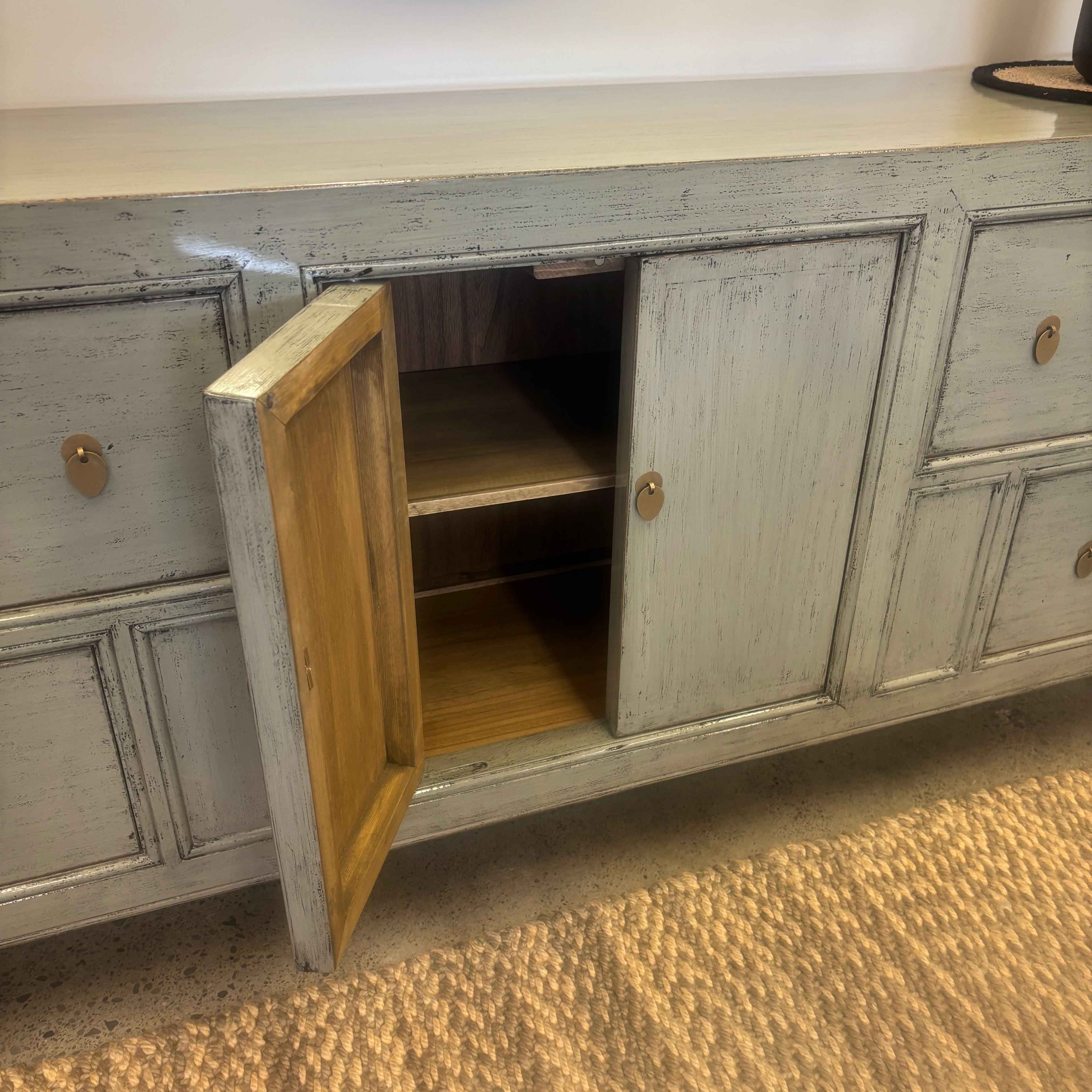 Morocco Sideboard with cupboard door open showing internal timber shelf storage