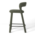Side view of Munich Barstool in textured pickle-green fabric