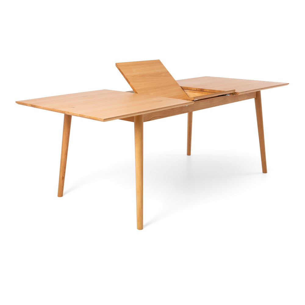 Close-up of the Nordik Extension Dining Table extension mechanism, highlighting the folding extension flap and quality craftsmanship.