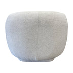 Rear view of the Nova Chair in Salt, highlighting its smooth curved backrest and contemporary upholstered design.