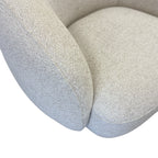 Close-up of the Nova Chair's Salt fabric, showcasing the soft woven texture and premium upholstery finish.