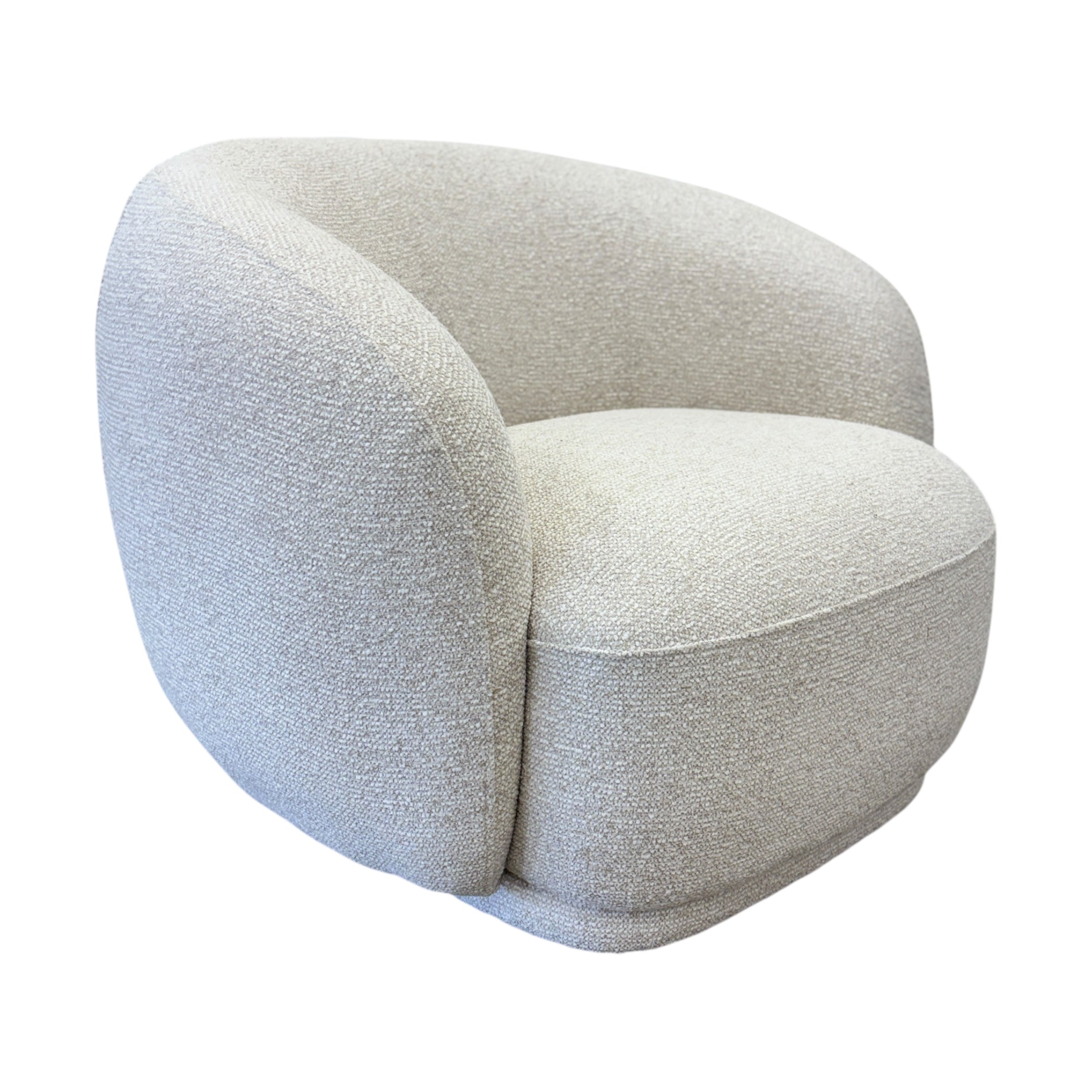 Side profile of the Nova Chair in Salt, highlighting its enveloping curved backrest and generously cushioned seat.