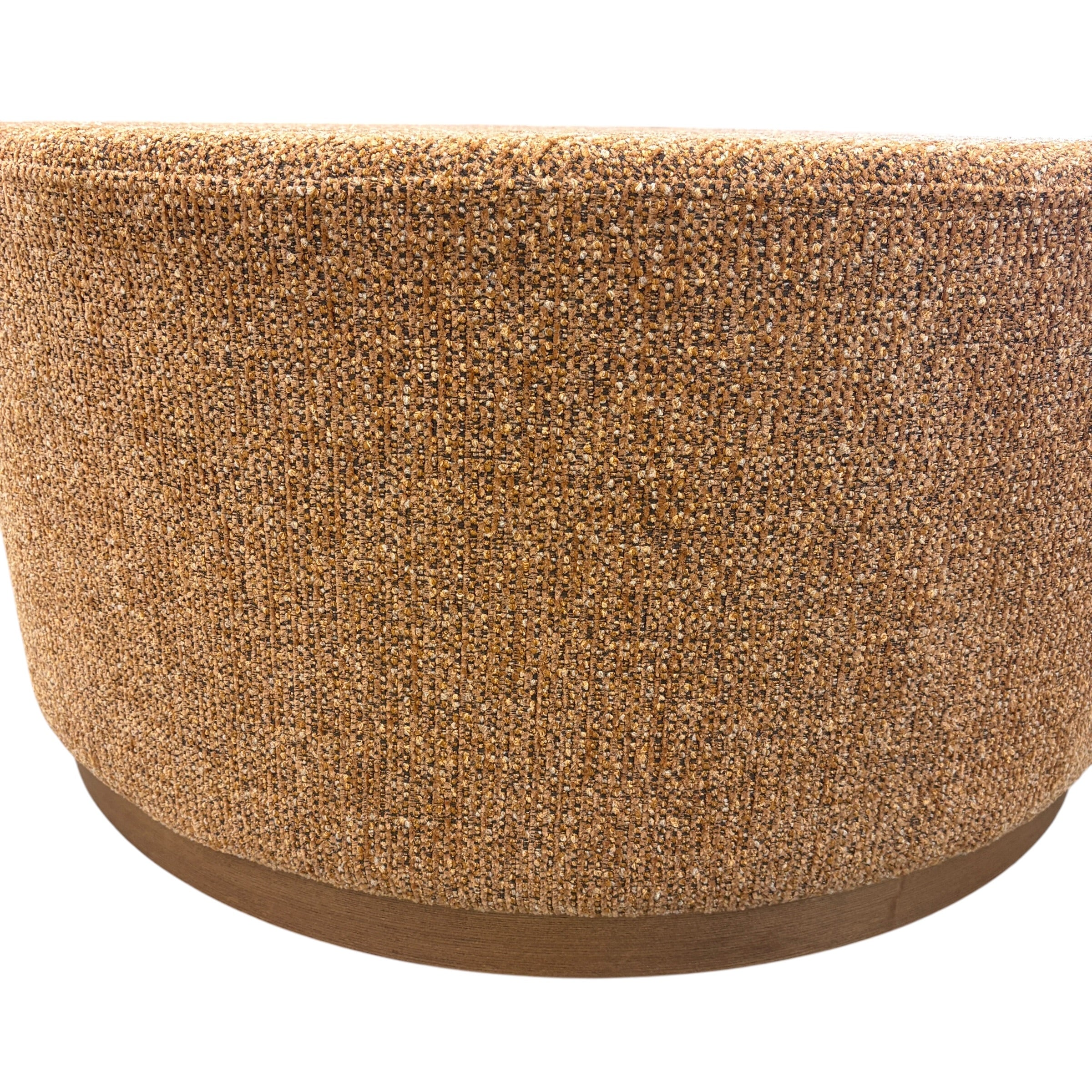 Nova Ottoman in copper textured fabric with a low round timber base