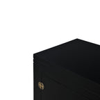 Close-up of the Oriental Cabinet showing the black mango wood finish and detailed antique brass hardware.