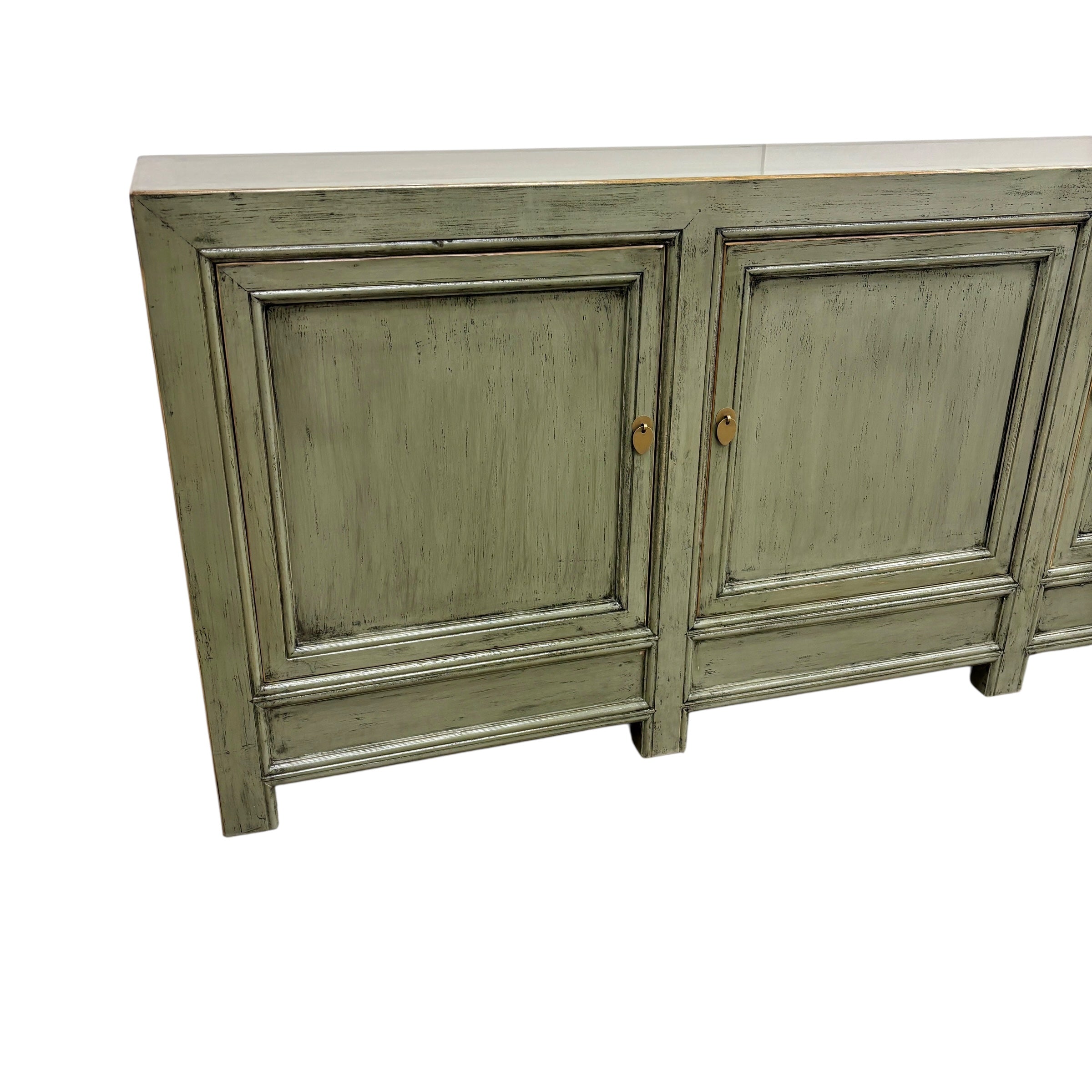 Angled view of Patrick Sideboard showing three panelled doors and long timber top