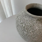 Close-up of Petros ceramic vase showing its textured stone-effect finish