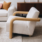 Post armchair styled in a contemporary living room with natural timber furniture and complementary décor.