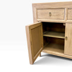 Quinn Sideboard in natural elm with door open showing internal shelving