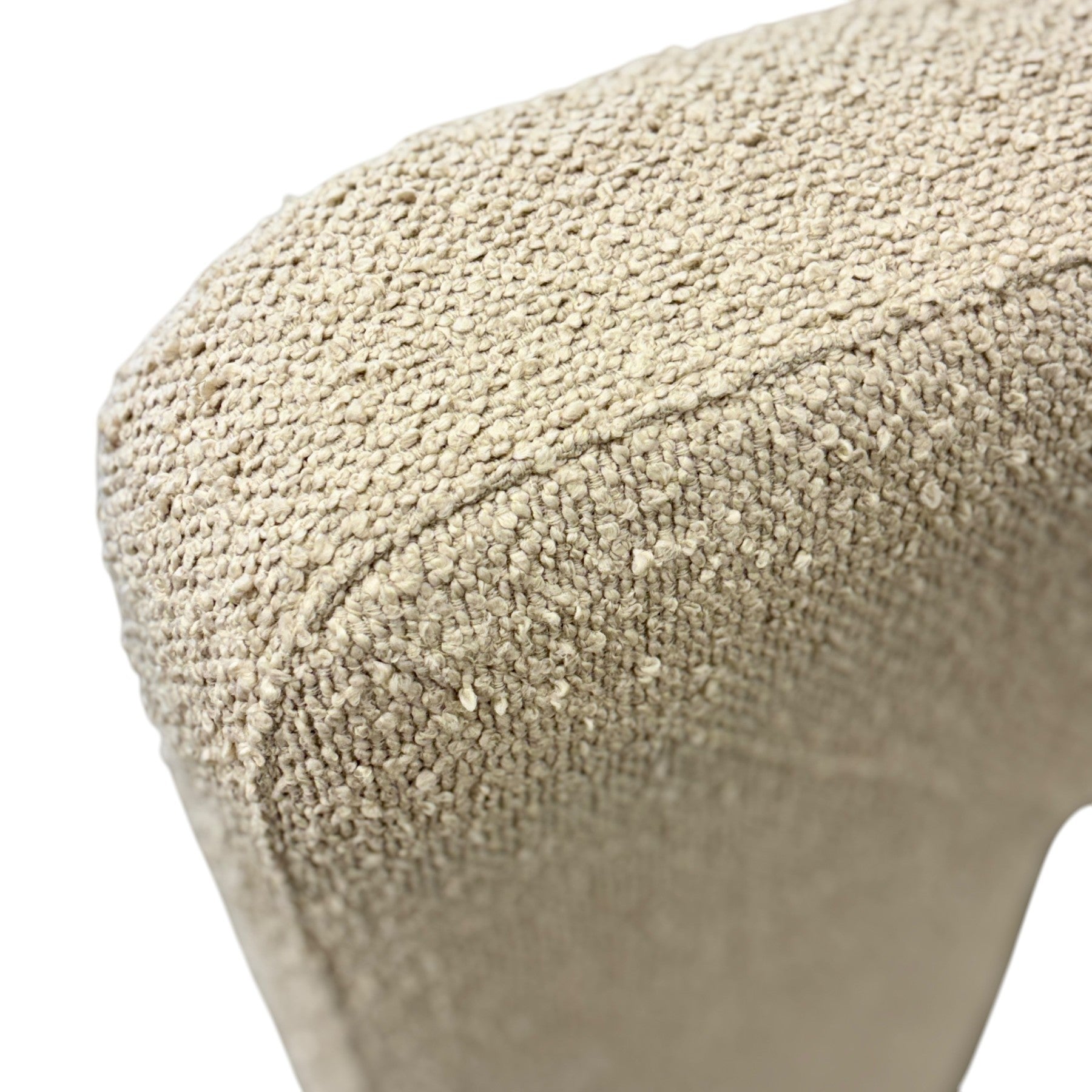 Close-up of the Reyna Chair's Bone fabric, highlighting the soft textured weave and premium upholstery finish