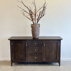 Rocco 3 Drawer Sideboard in warm iron brown mango wood styled with a decorative vase