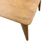 Close-up of the Rocco Dining Table's solid mango wood tabletop, showcasing the natural timber grain, softly rounded corners and smooth finish.