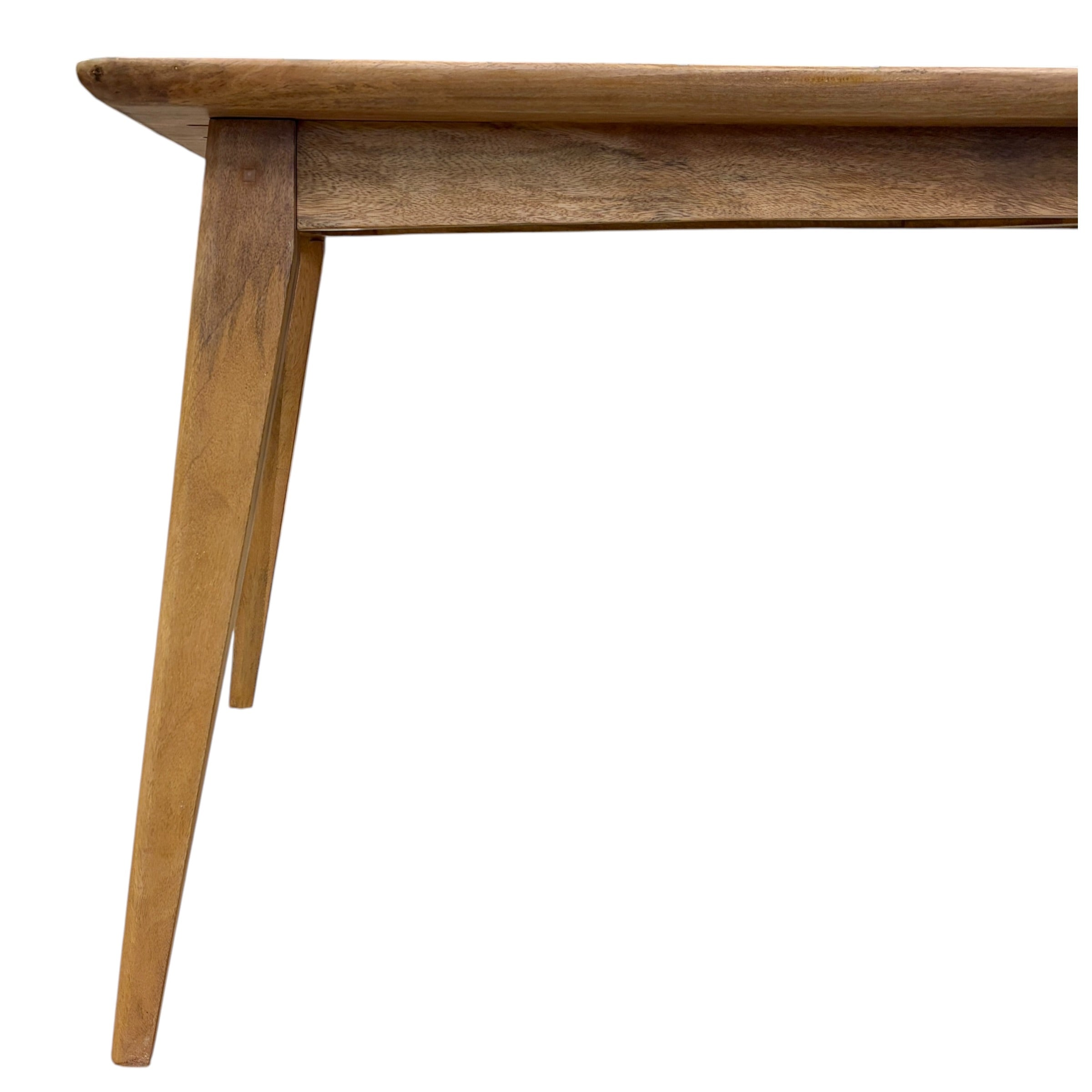 Close-up of the Rocco Dining Table's tapered solid mango wood leg, highlighting the clean lines and quality craftsmanship.