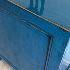Close-up of drawers and handles on the Rosa Sideboard in royal blue