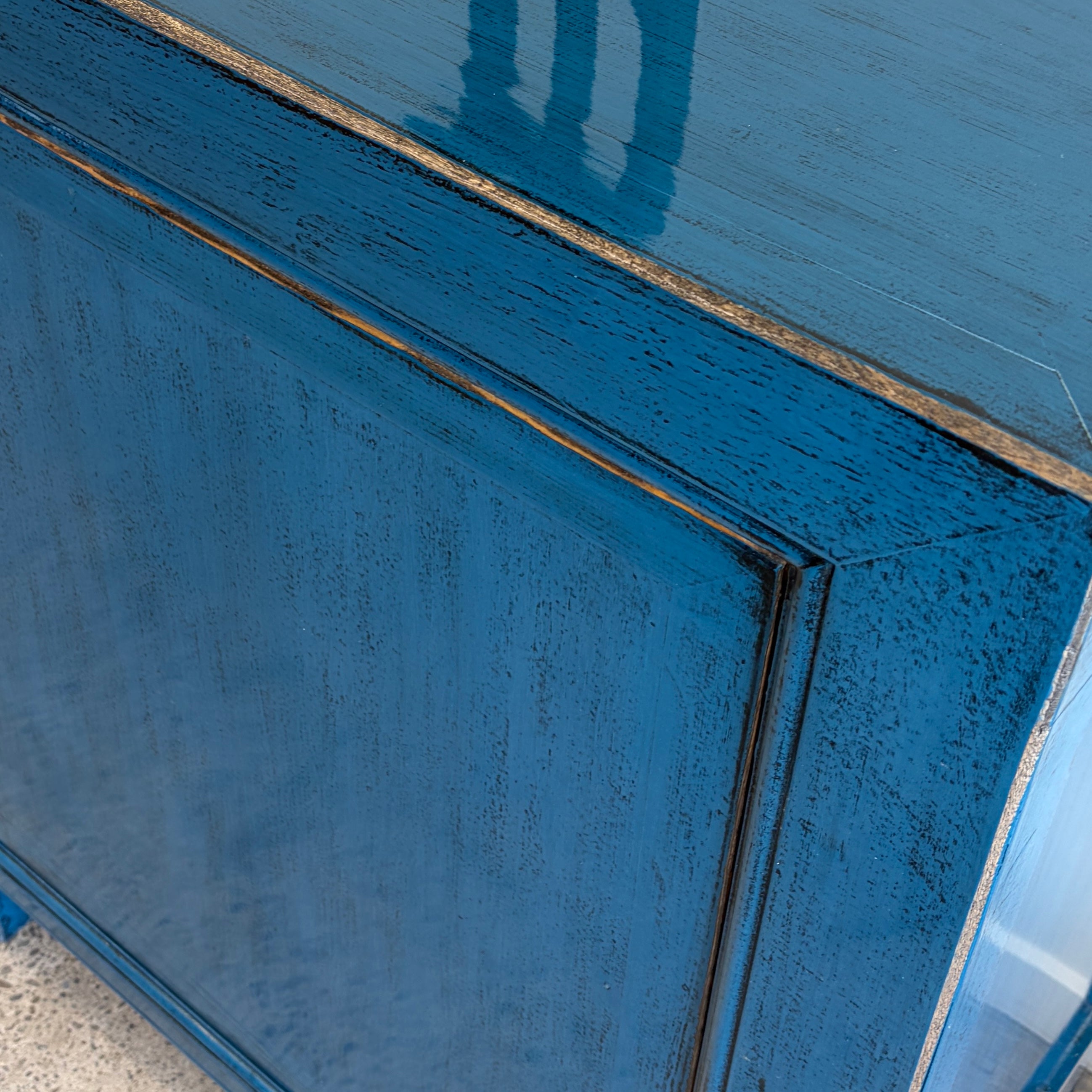 Close-up of drawers and handles on the Rosa Sideboard in royal blue