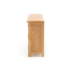 Side view of Salisbury Buffet 3 Door showing natural American white oak grain and panelled detail