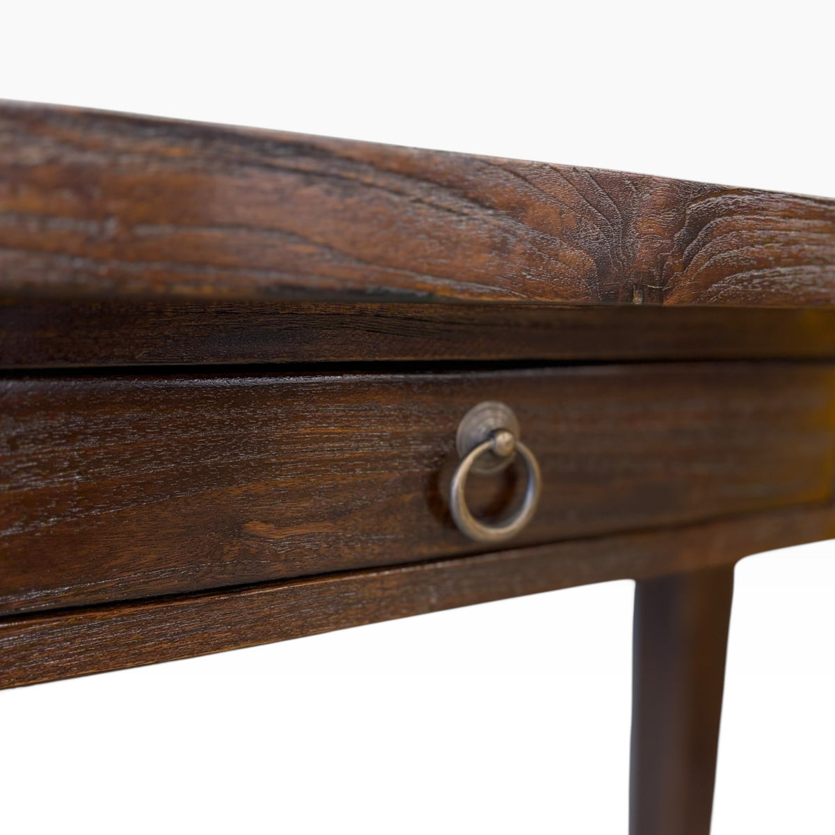 Close-up of console desk drawer with metal ring handle and textured teak timber