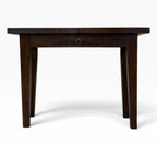 Front view of solid teak console desk with dark rustic finish and central storage drawer