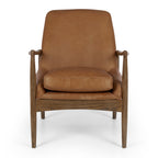 Steiner Occasional Chair in Cognac with a solid oak frame and top-grade aniline leather upholstery.