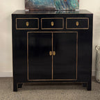 Sunny Sideboard in Black with three drawers, two doors and brass hardware