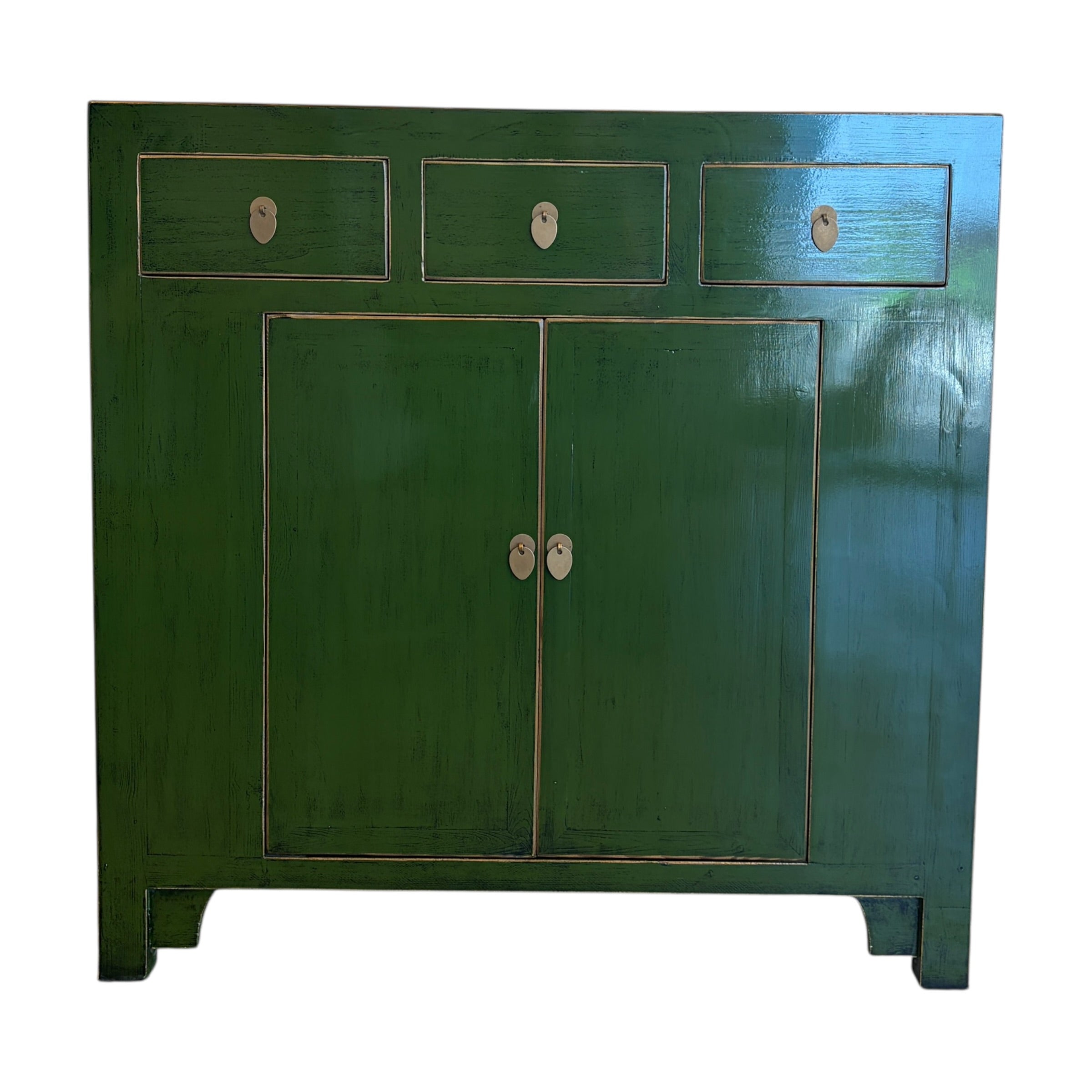 Sunny Sideboard Emerald Green front view with three drawers, two cupboard doors and brass toned handles