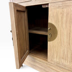 Sunny Sideboard in Natural Elm with cupboard doors open showing internal shelf storage