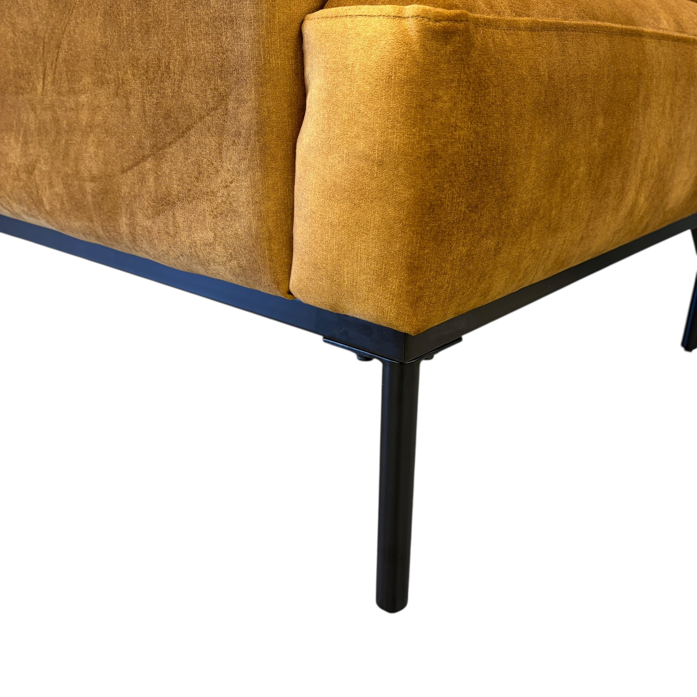 Close-up of the Sydney armchair leg, showcasing its quality craftsmanship and contemporary design.