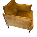 Side profile of the Sydney armchair in Gold with supportive cushioning and contemporary styling.
