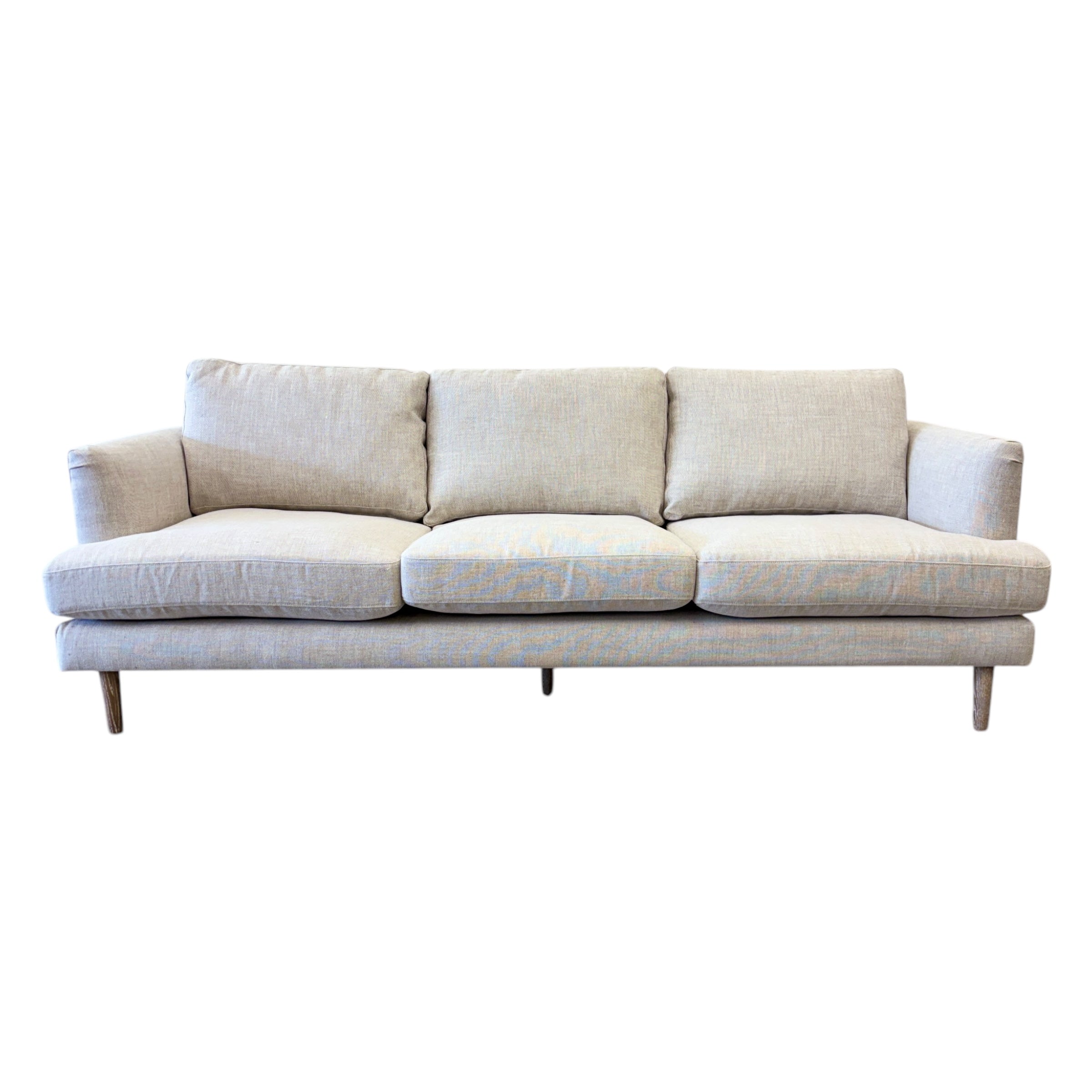 Thomas Sofa in Oat Linen featuring clean contemporary lines, deep seat cushions and solid timber legs.
