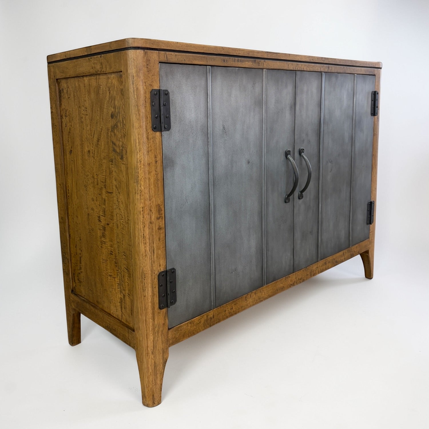 Angled view of Tin Man 2 Door Sideboard showing natural timber frame and metal cabinet doors