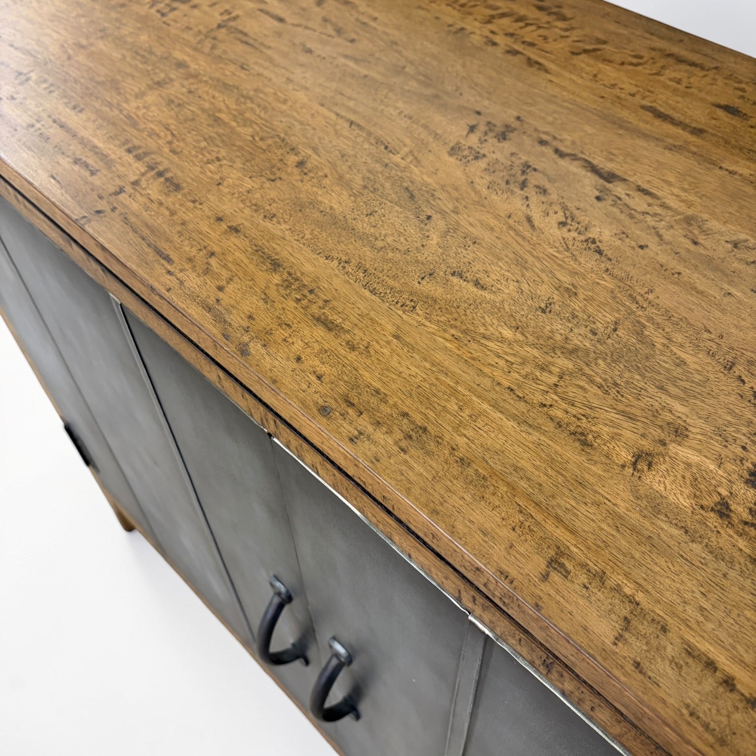 Close-up of the natural timber grain and metal door detail on the Tin Man 2 Door Sideboard