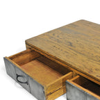 Tin Man Coffee Table with drawers open, showing practical storage and brushed metal drawer fronts.