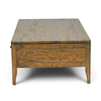 End view of the Tin Man Coffee Table in solid mango wood with a Smokehouse finish.