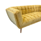 Angled view of the Towelie sofa in Yellow, showcasing its clean lines and comfortable seating.