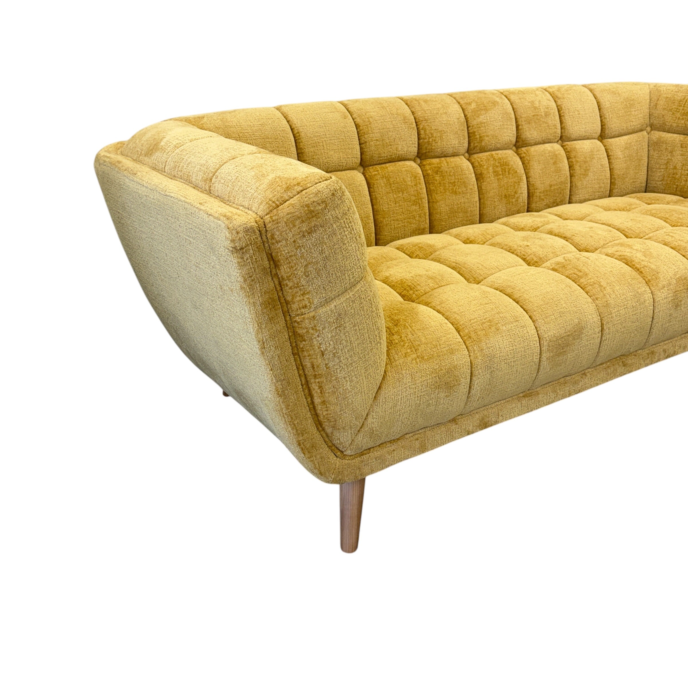 Angled view of the Towelie sofa in Yellow, showcasing its clean lines and comfortable seating.
