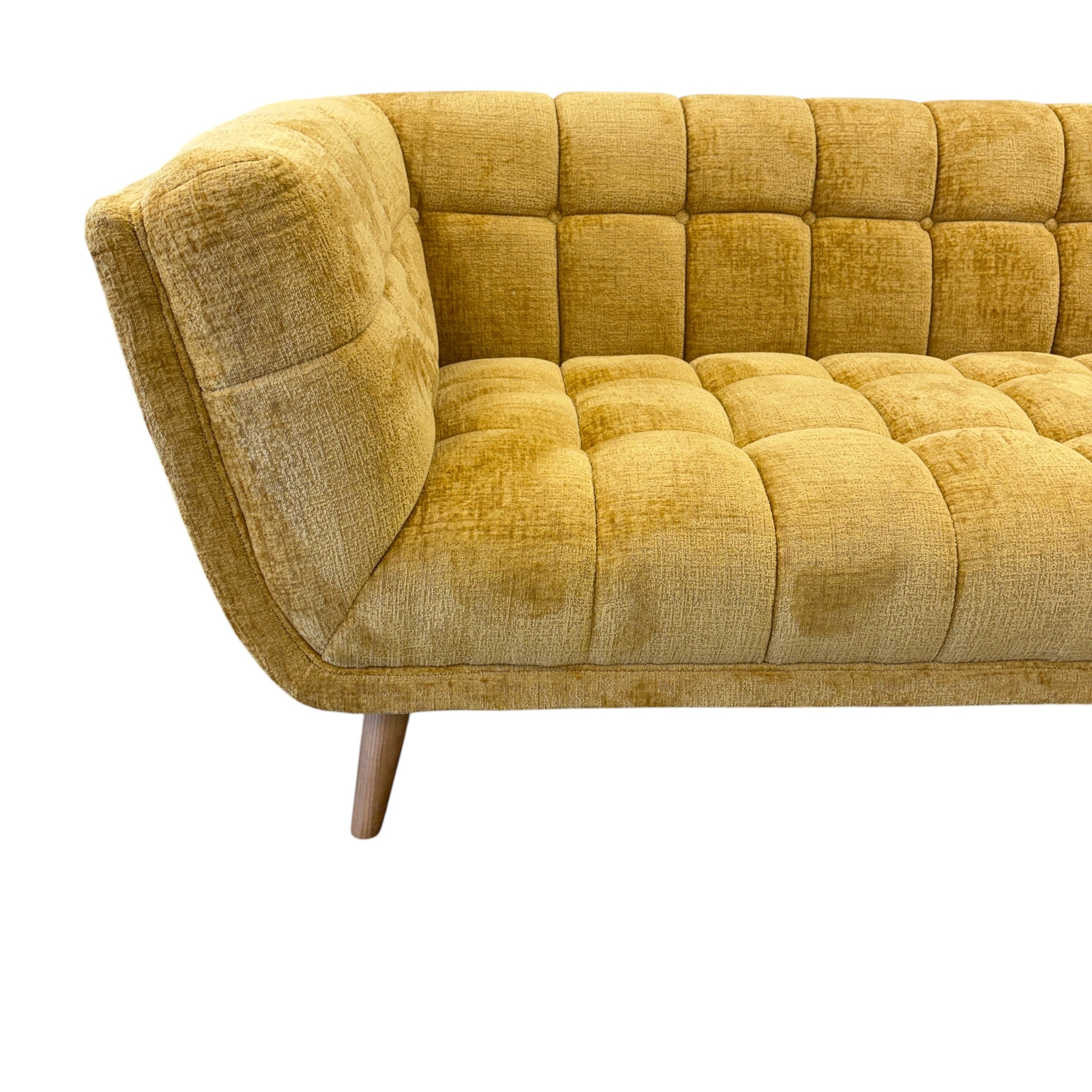 Side profile of the Towelie sofa in Yellow with supportive cushions and contemporary styling.