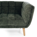 Close-up of the Towelie Sofa's timber leg, showcasing the natural timber finish and quality craftsmanship.