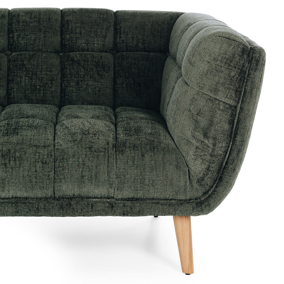 Close-up of the Towelie Sofa's timber leg, showcasing the natural timber finish and quality craftsmanship.