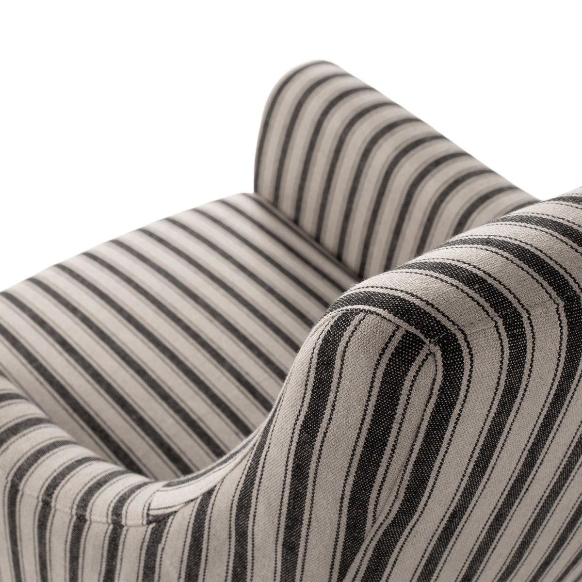 Close-up of Tyler Tub Chair showing black and linen striped upholstery and curved arms