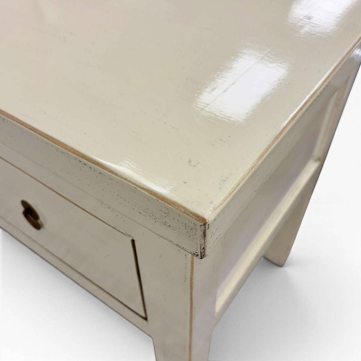Valtteri Low Console showing glossy cream top and distressed edge detail