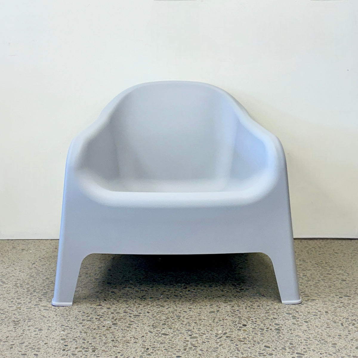 Front product view of Wainui Outdoor Chair in Grey in showroom