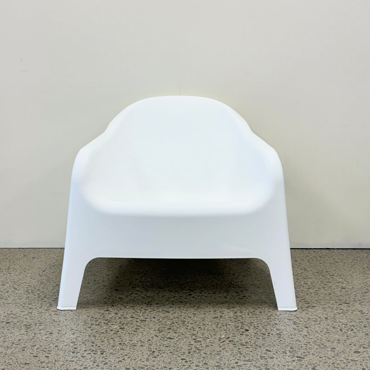 Front product view of Wainui Outdoor Chair in White in showroom