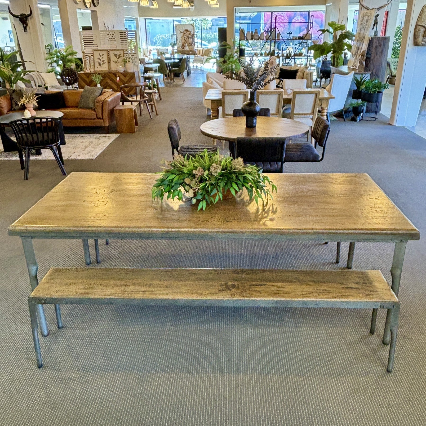 Side view of the Workman Dining Table, showcasing its clean lines, sturdy construction and timeless timber design.